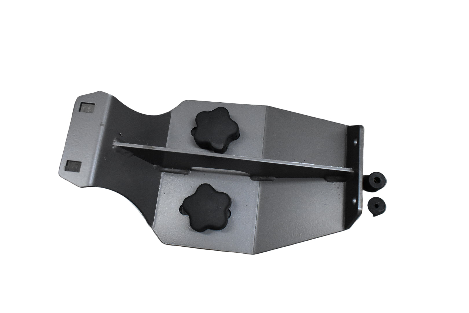 Metal bracket with black knobs on a gray tiled floor