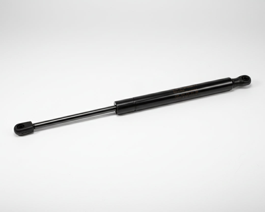 Black shock absorber on a white background