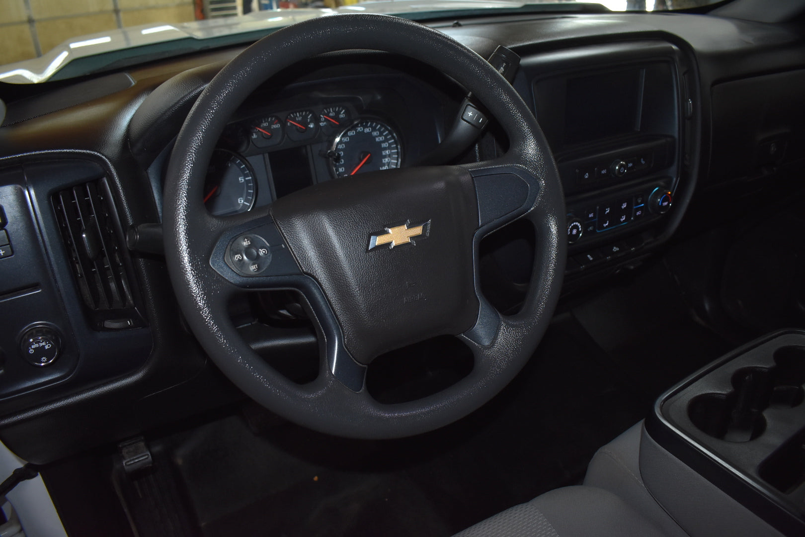 Steering wheel with Chevrolet logo in a vehicle interior