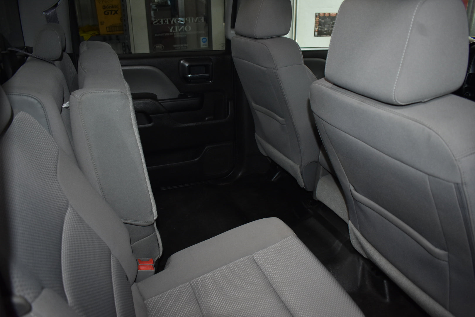 Gray interior of a vehicle with three seats