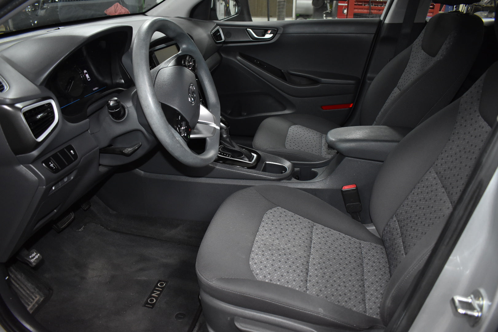 Car interior with gray seats and dashboard