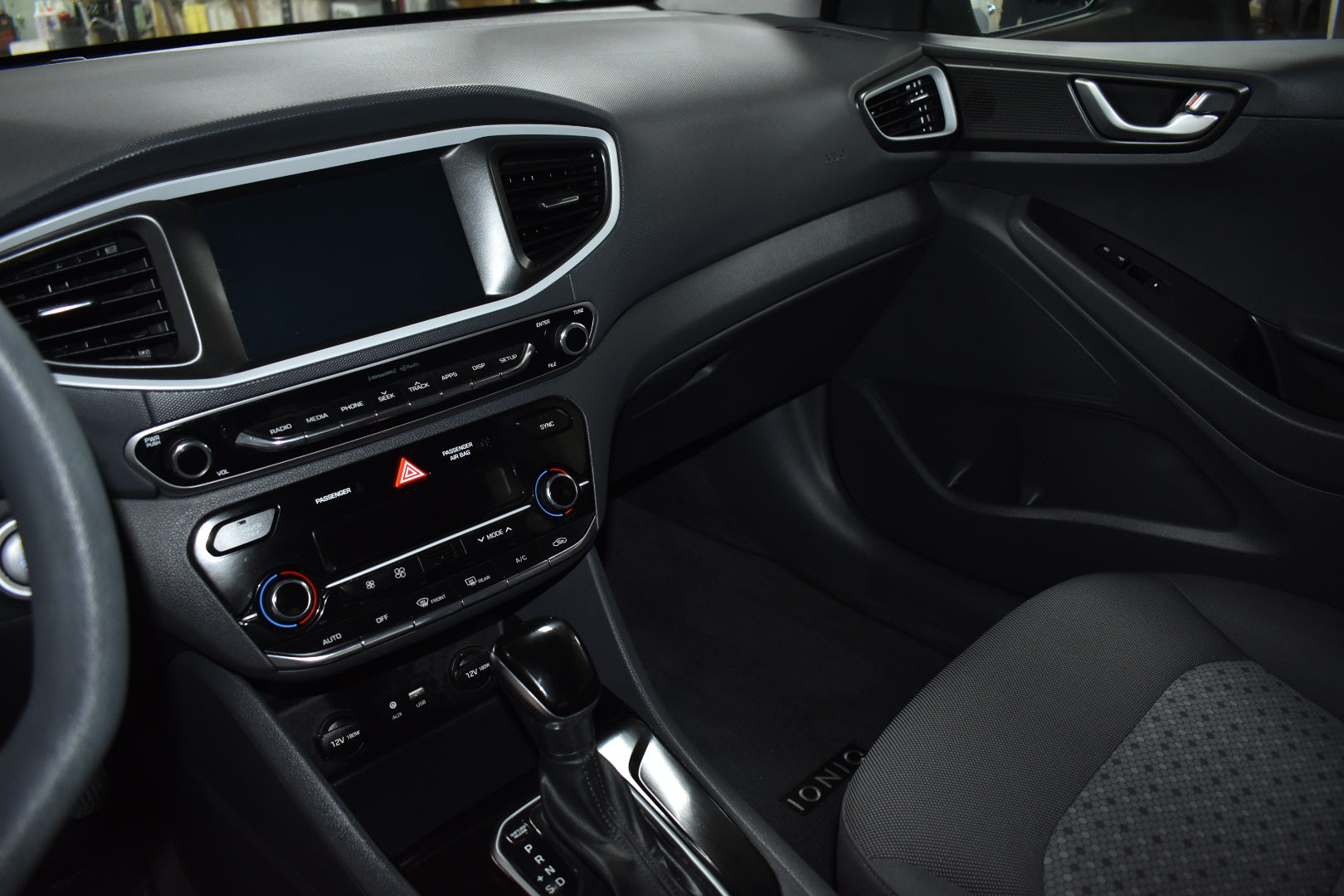 Car interior with dashboard and steering wheel