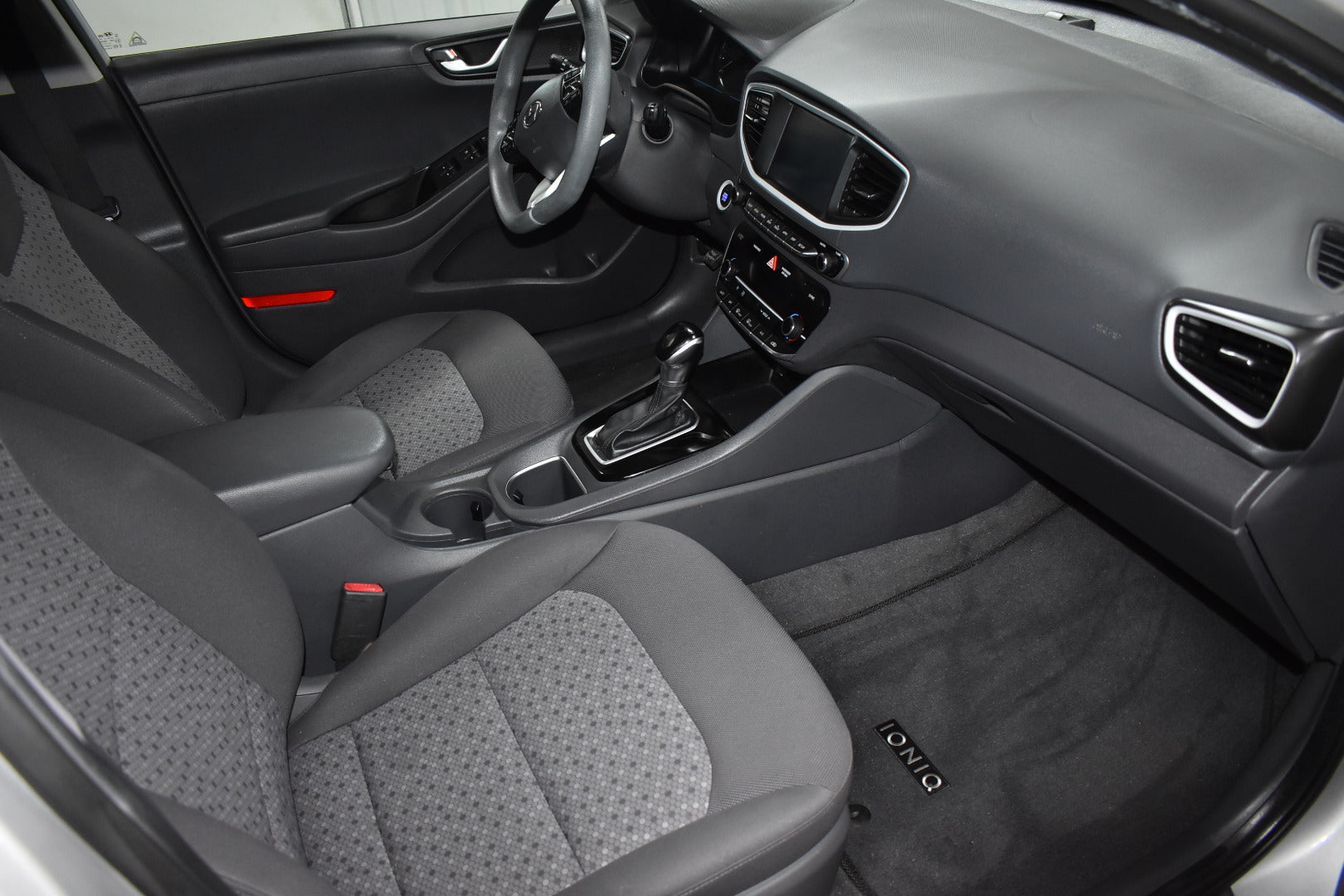 Car interior with gray seats and dashboard