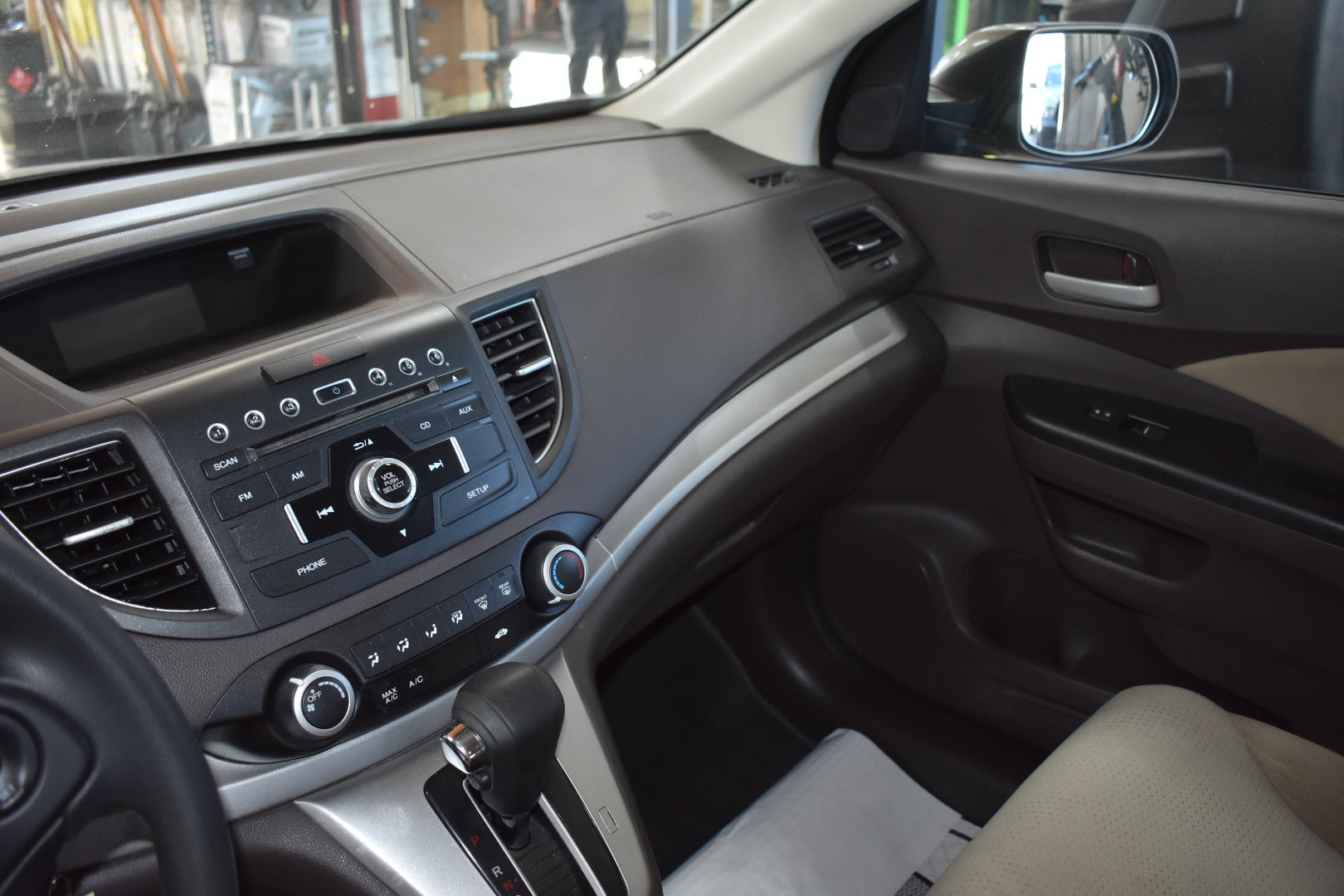 Car interior with dashboard and steering wheel visible