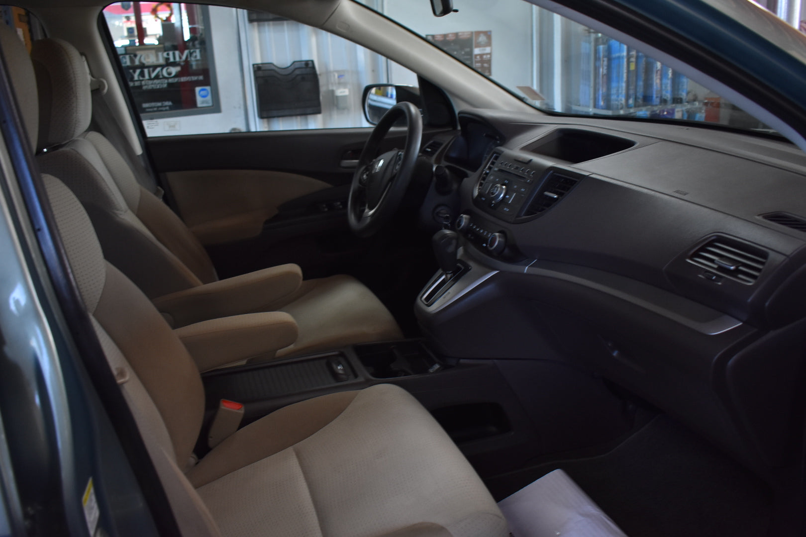 Car interior with beige seats and dashboard details