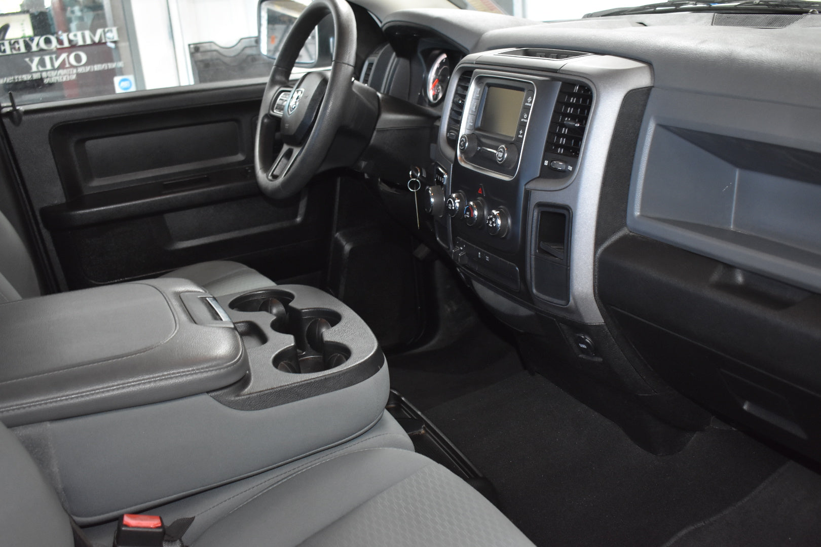 Car interior with dashboard and steering wheel