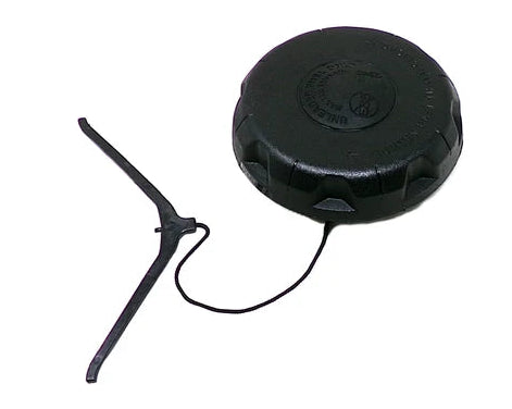 A black plastic circular cap with a small black plastic pull tab attached by a short cord, shown on a plain white background.
