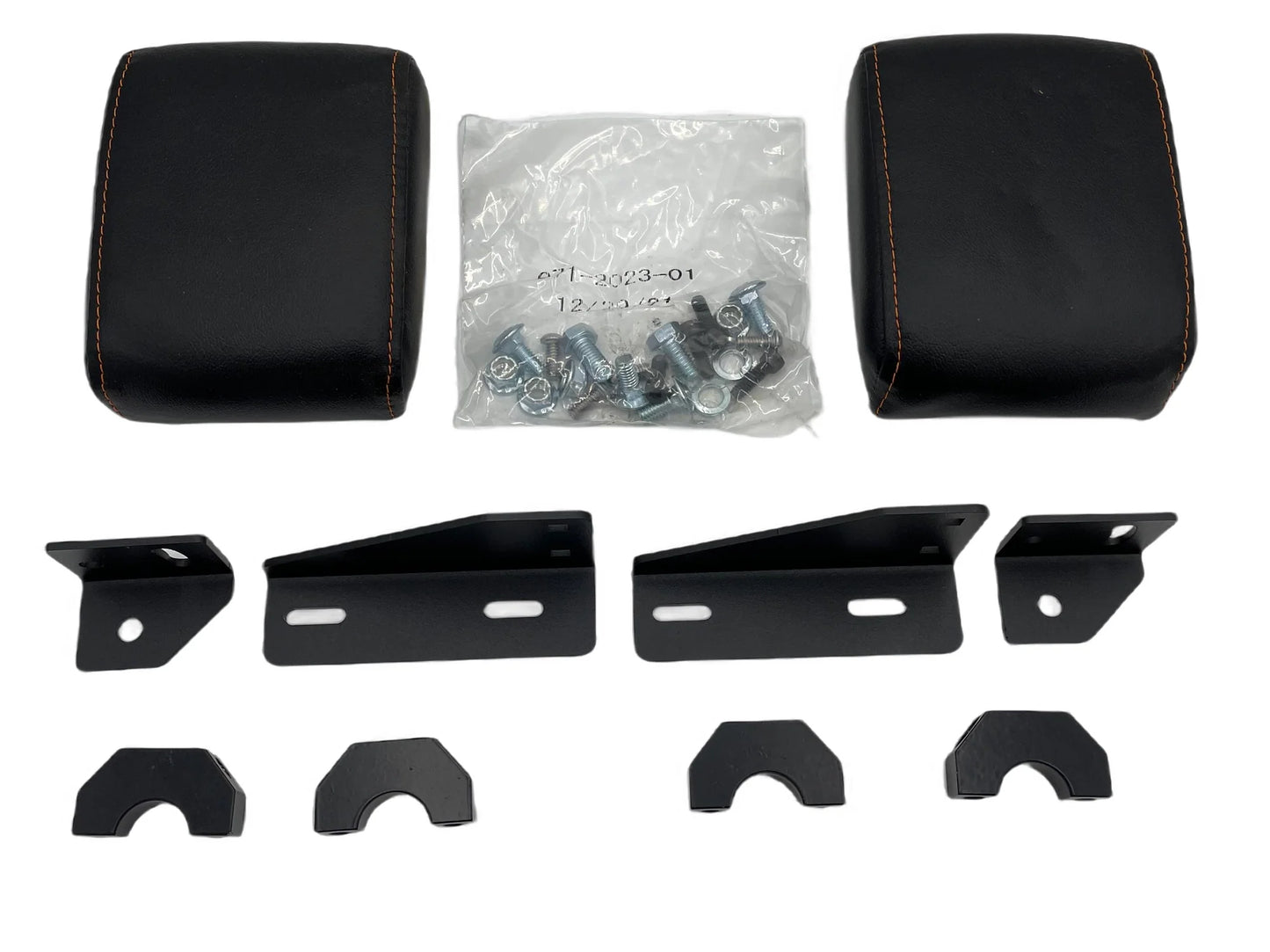 Set of black car headrests and mounting brackets with a clear plastic bag containing screws on a white background.