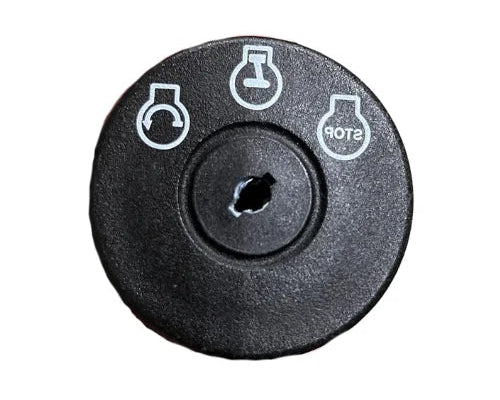 A round black plastic cap with a central hole and three white printed symbols, including one that reads STOP, on a plain white background.