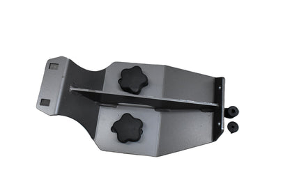 Metal bracket with black knobs on a gray tiled floor