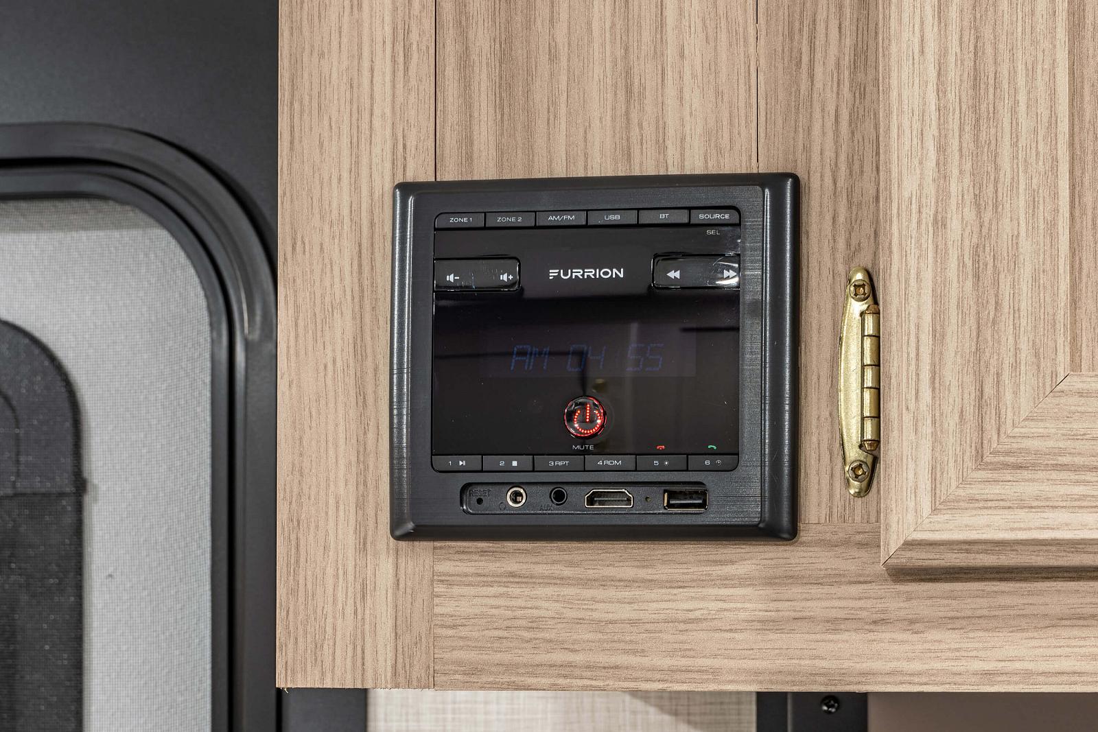 Furrion electronic control panel on a wooden surface