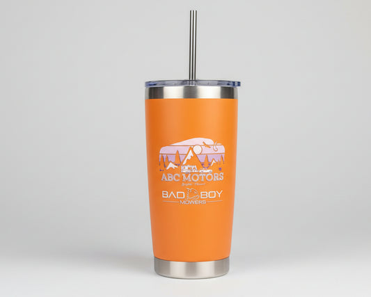 Orange tumbler with a logo and text on a gray background