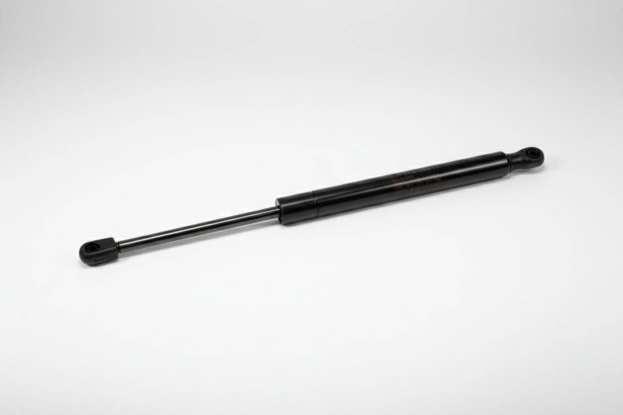 Black shock absorber on a white background