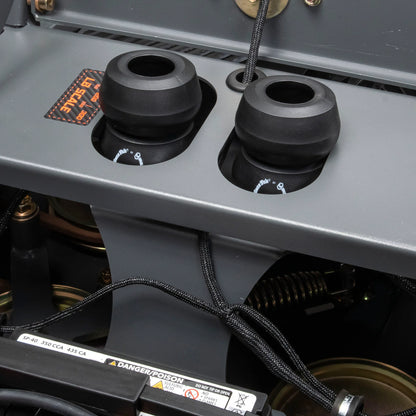Close-up of a vehicle's engine compartment with a focus on the air intake system.