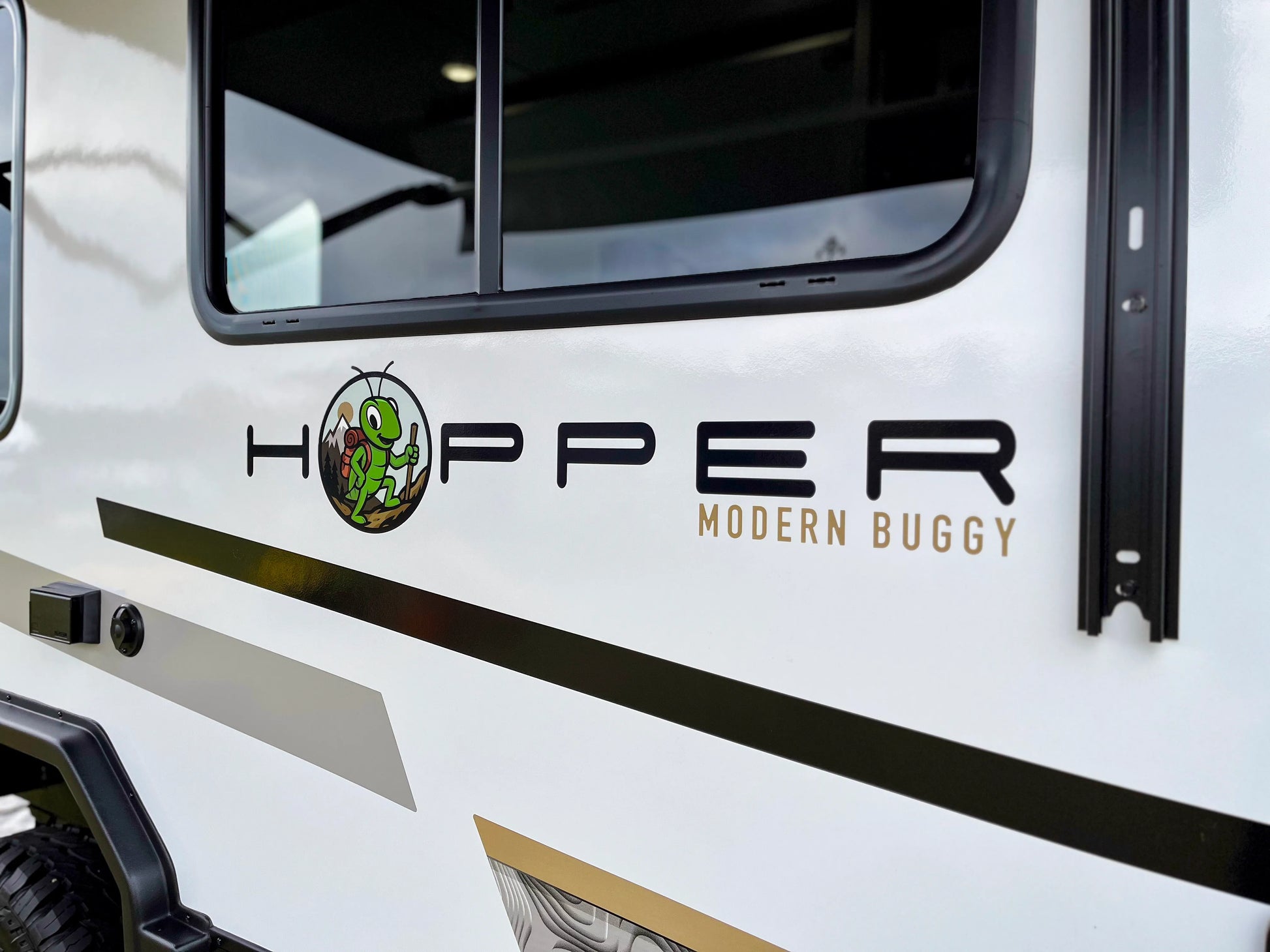Hopper Modern Buggy logo on a vehicle exterior