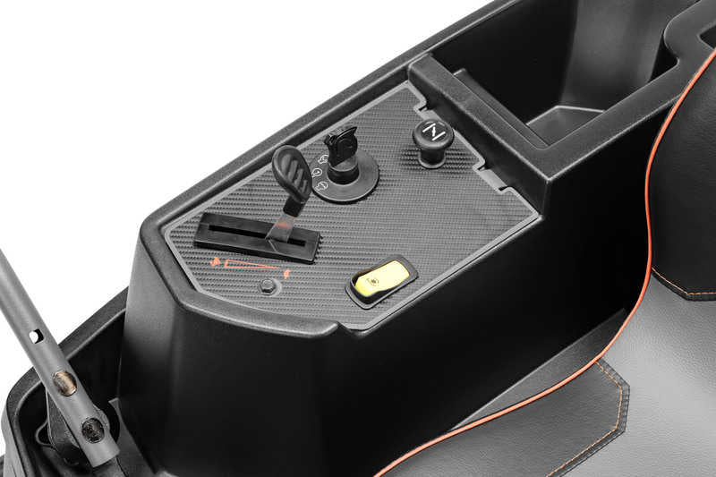 Close-up of a black electronic device with control buttons on a white background