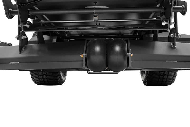 Close-up of a black lawn mower with visible wheels on a white background