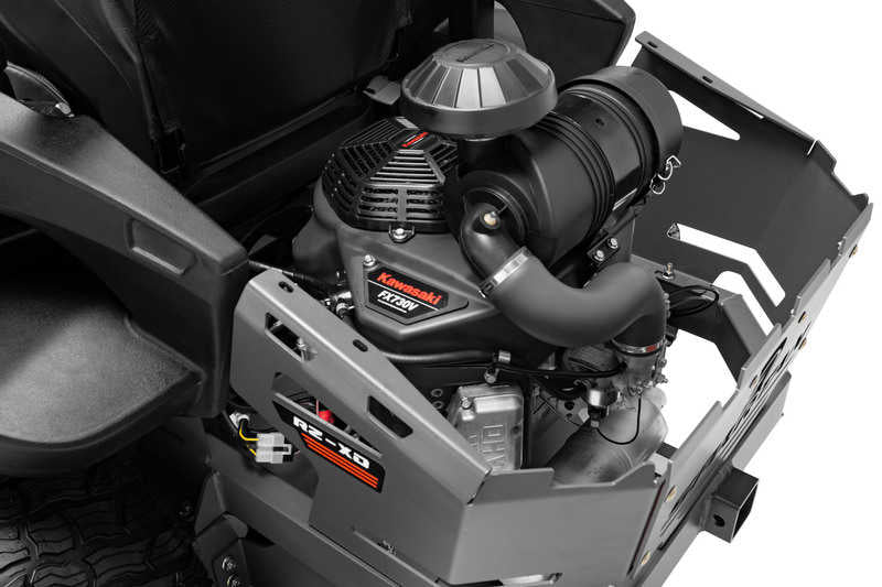 Close-up of a Kawasaki engine on a vehicle, with a focus on the brand name.