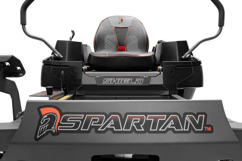 Close-up of a riding lawn mower with 'Shield' and 'Spartan' branding on a white background