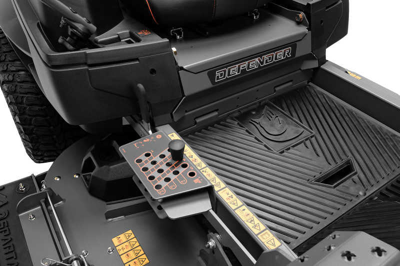 Close-up of a truck bed with a 'Defender' branded toolbox.