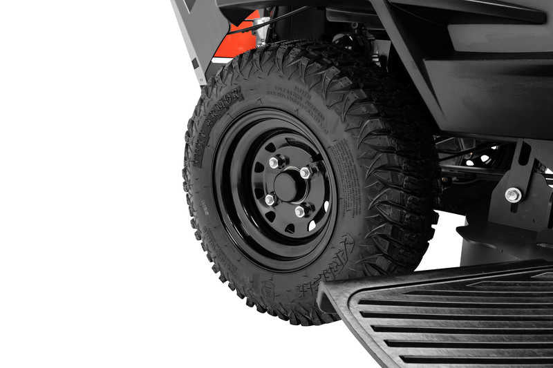 Close-up of a tire on a vehicle with a white background