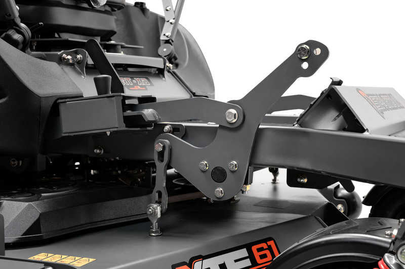 Close-up of a lawn mower with visible branding on a white background