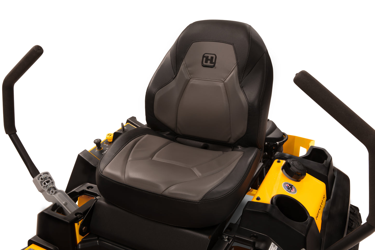 Gray seat on a lawn mower with visible brand logo against a white background