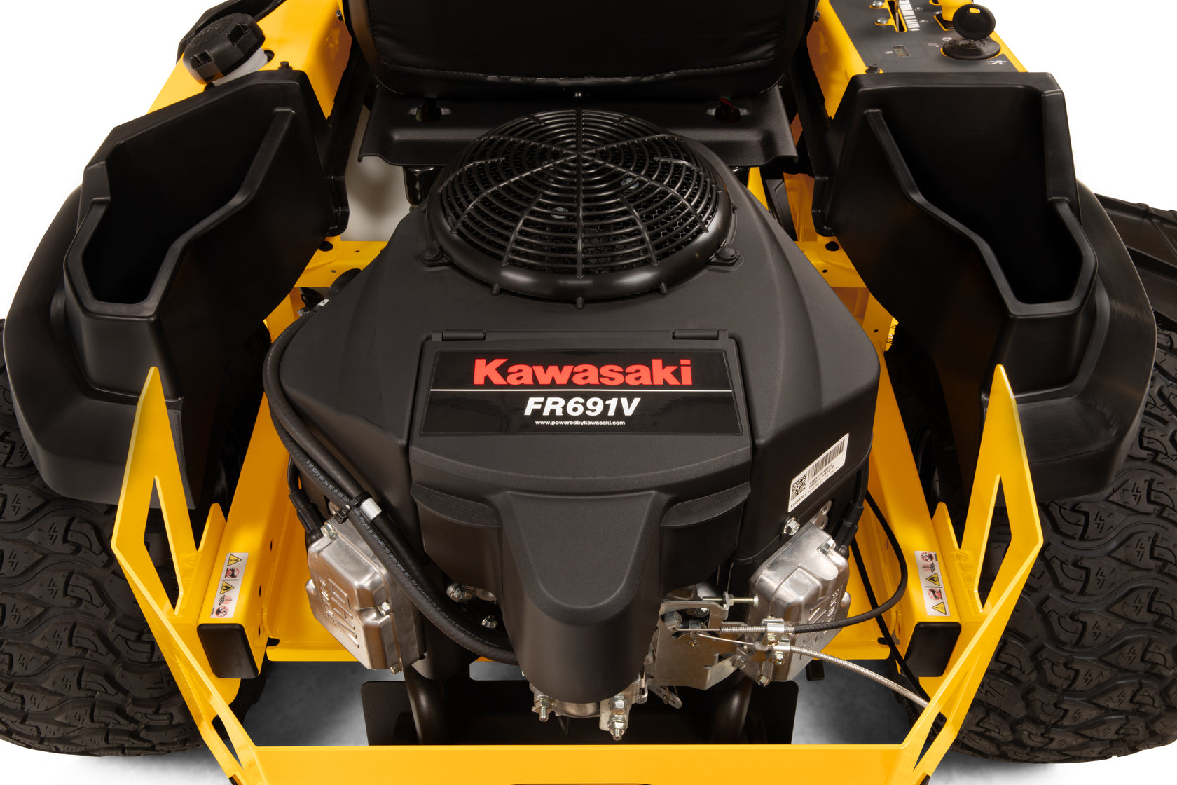 Close-up of a Kawasaki FR691V engine on a yellow lawn mower.