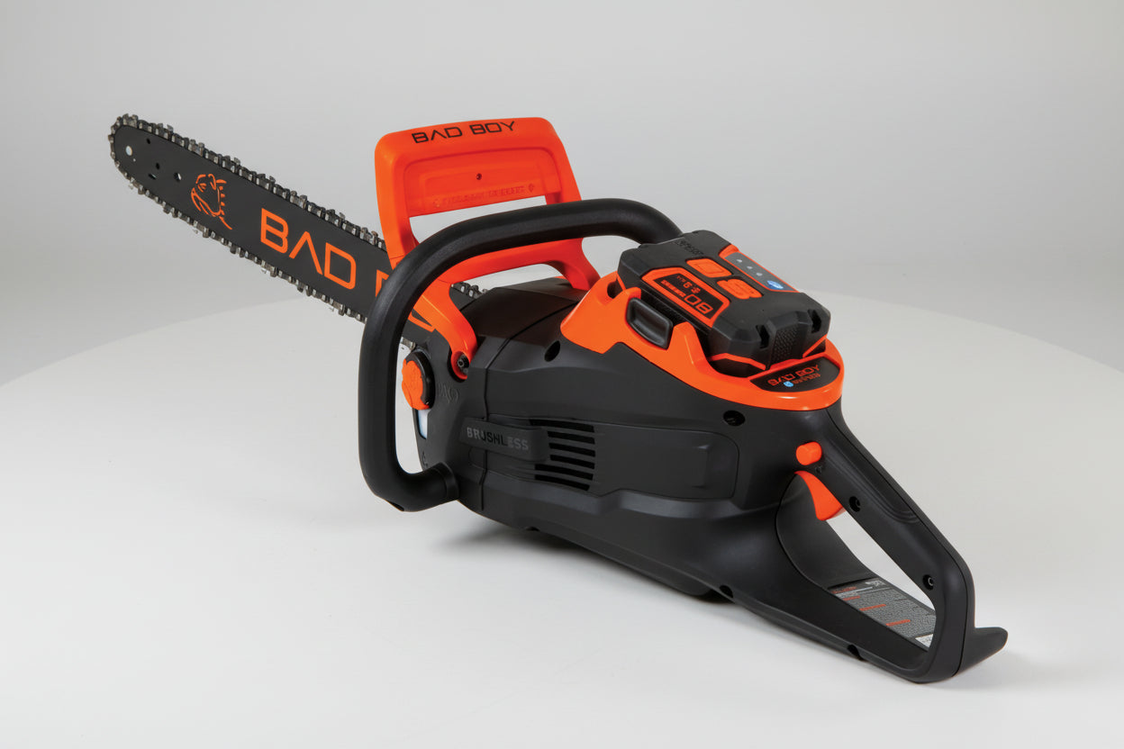 Black and orange chainsaw on a white background
