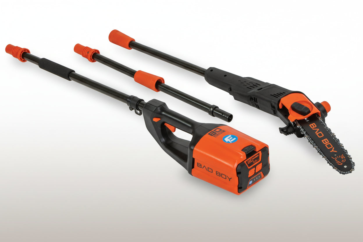 Orange and black pole saw on a white background