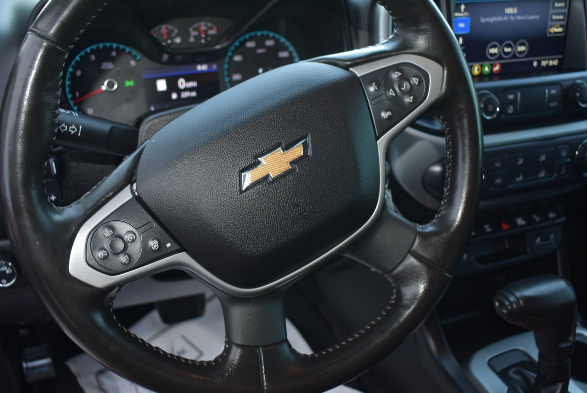 Steering wheel with Chevrolet logo in a car interior