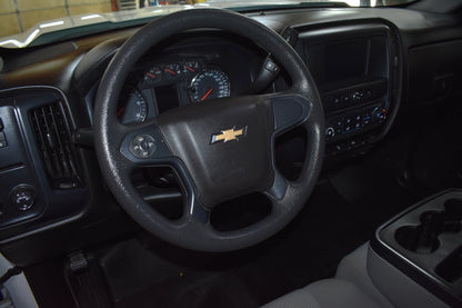 Steering wheel with Chevrolet logo in a vehicle interior