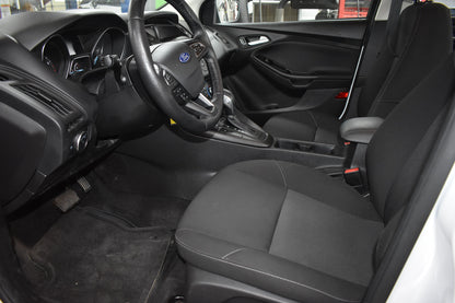 Car interior with steering wheel and dashboard