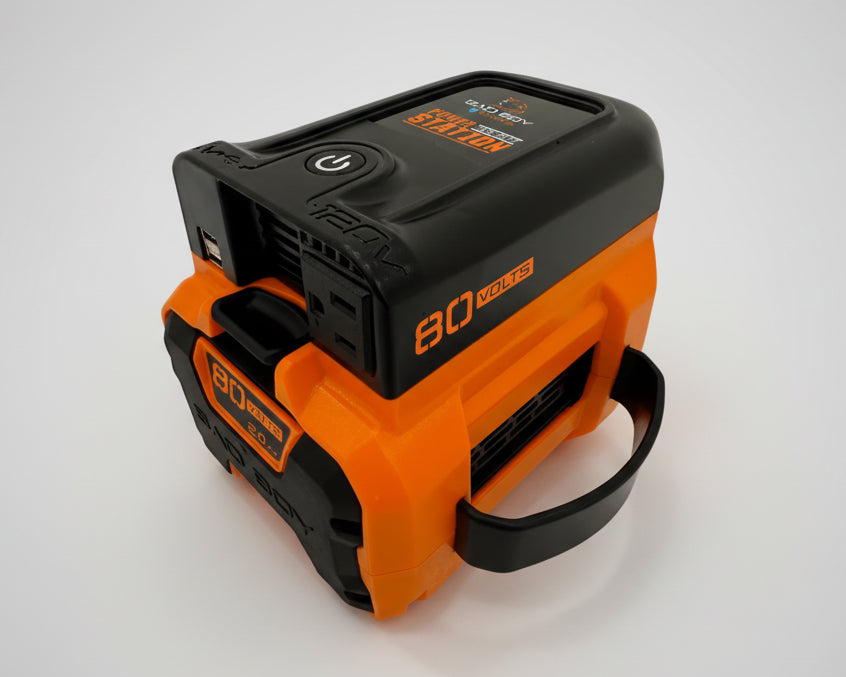 Orange and black battery pack with visible brand logo on a white background