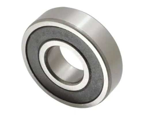 A single metallic ball bearing shown at an angle on a plain white background.
